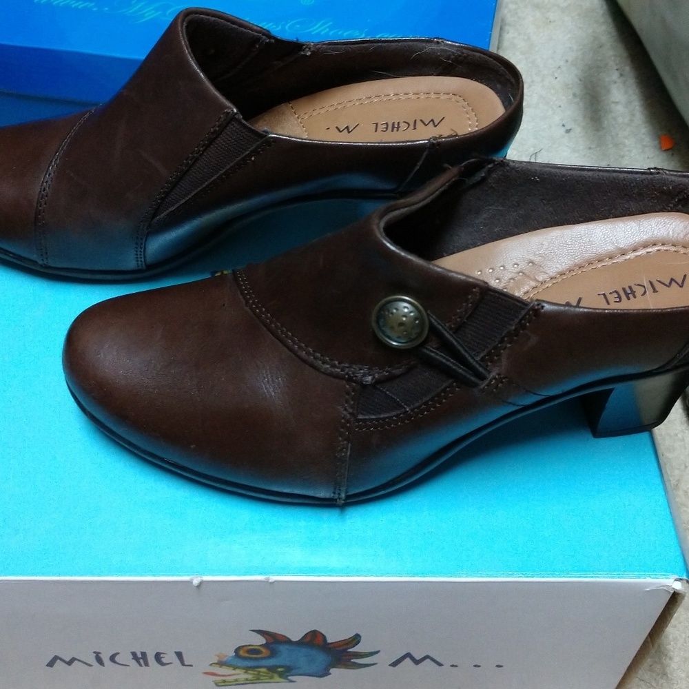 Brown mules with hill